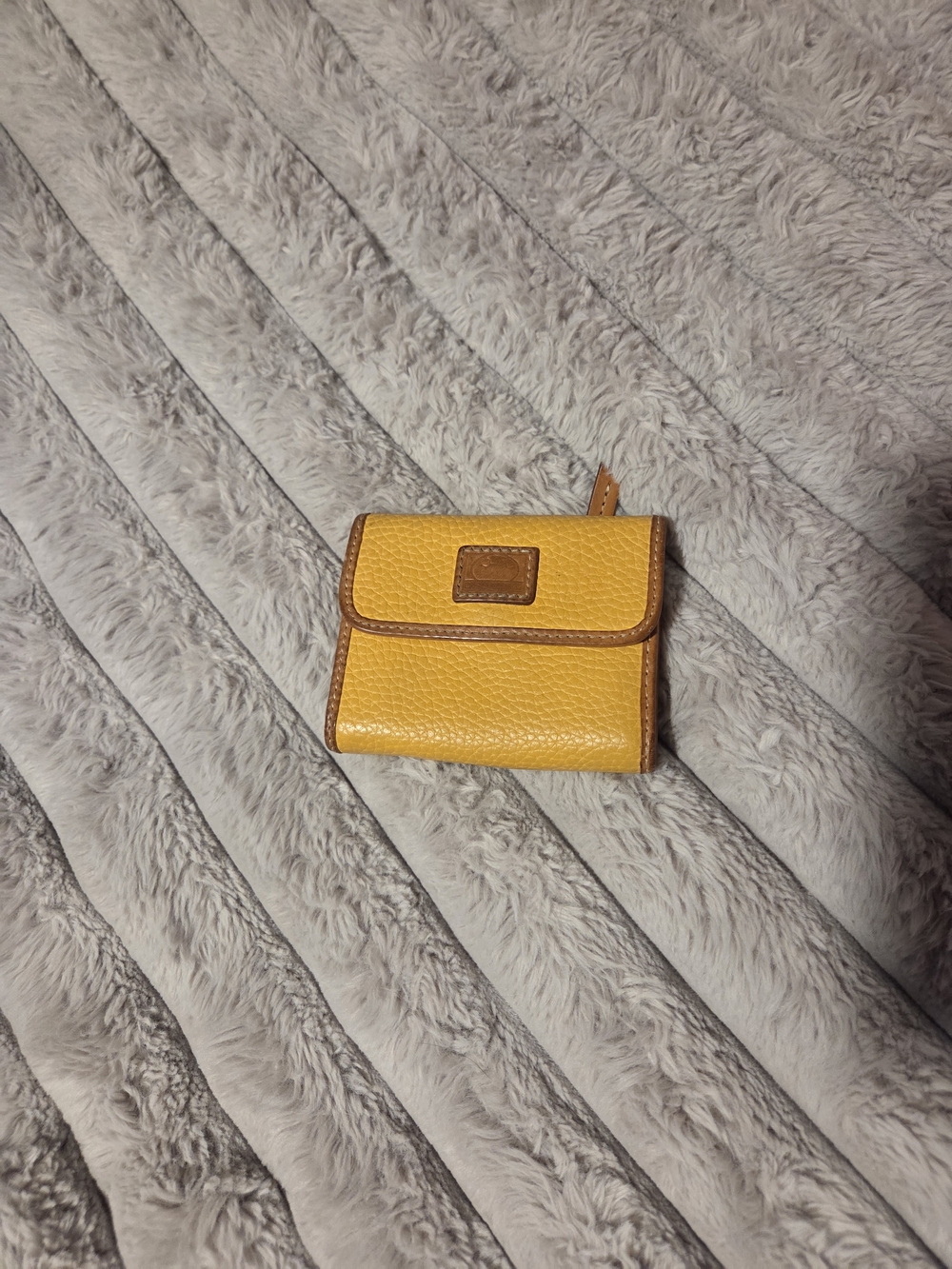Dooney & Bourke Yellow Pebbled Leather Trifold Wallet with Brown Trim